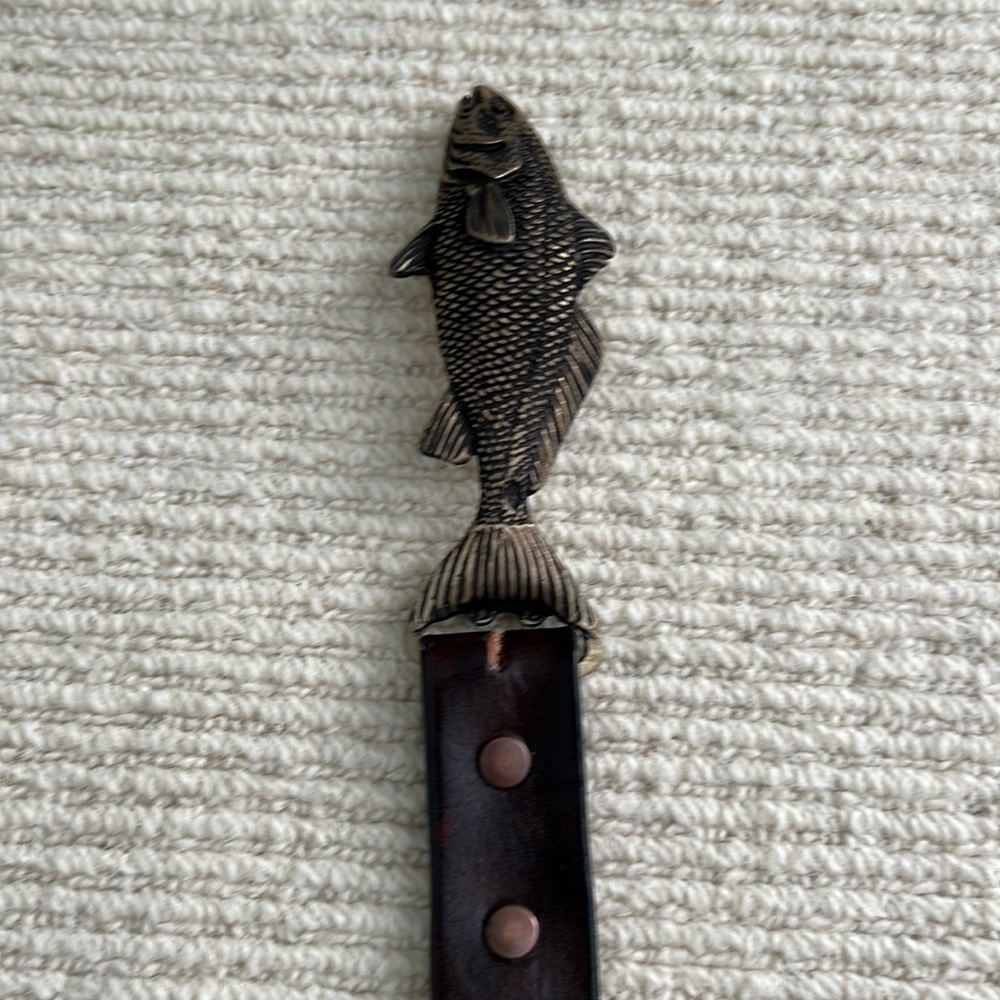 Brown leather belt with brass tone fish buckle